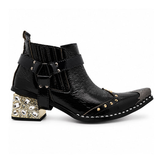 Black patent leather men's pointed toe ankle boot with metal toe cap, studded details, and a gold rhinestone-embellished