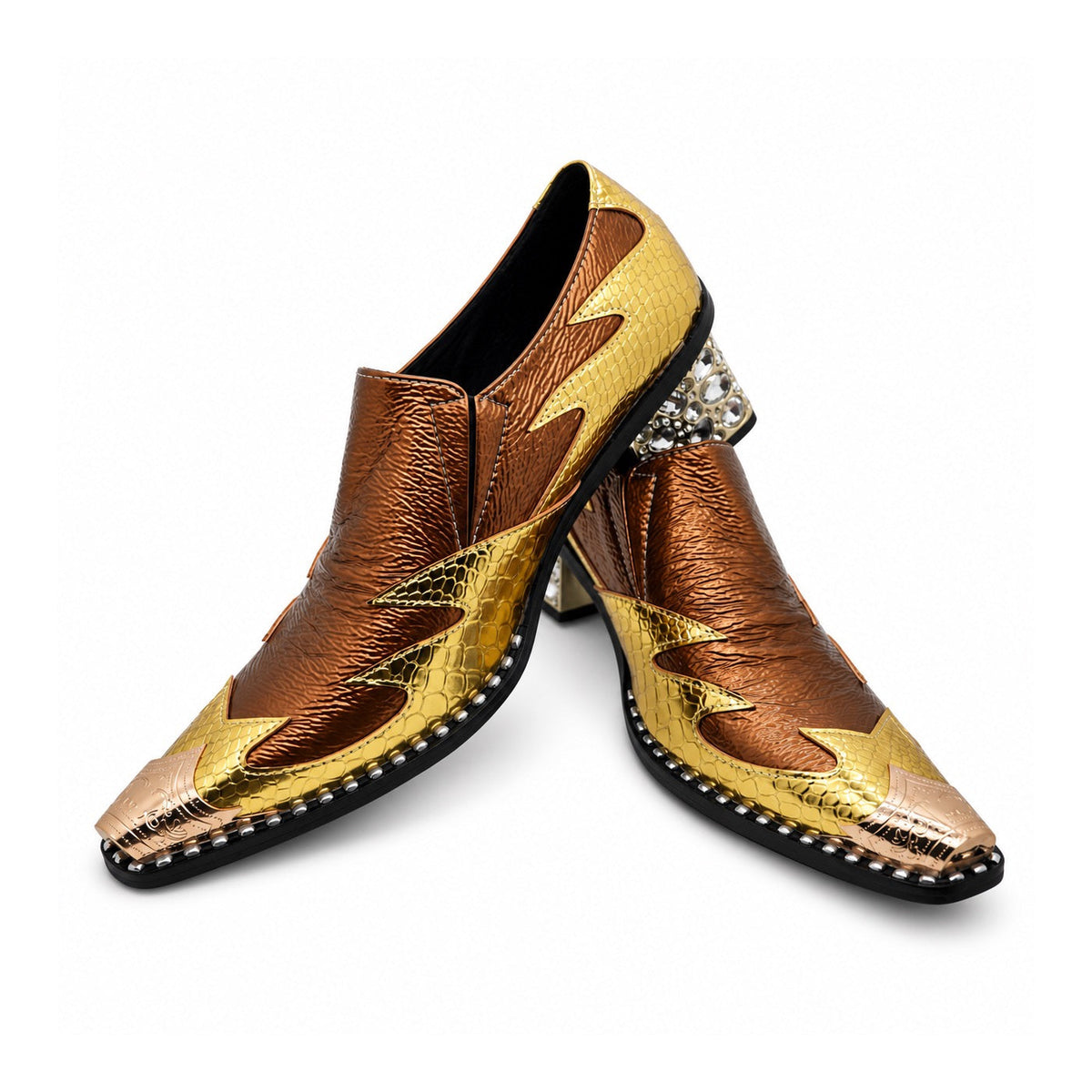 A pair of men's metallic gold and bronze slip-on western dress shoes with a pointed metal toe and a rhinestone-studded block