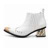 A pair of Aomishoes white genuine leather Chelsea boots with a gold metal pointed toe, gold studs, and a