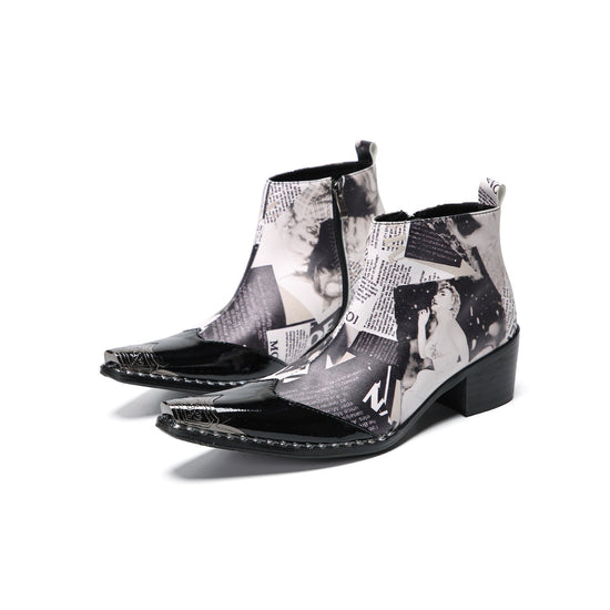 Pair of Aomishoes men's newspaper print ankle boots with pointed patent leather toe caps and side zippers on a white