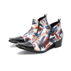 Pair of men's abstract print ankle boots with black leather pointed toe and metal tip, side zippers, and black block heels.