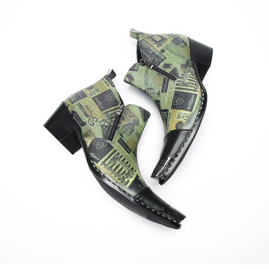 A pair of men's green and black patterned ankle boots with pointed metal toes and side zippers.