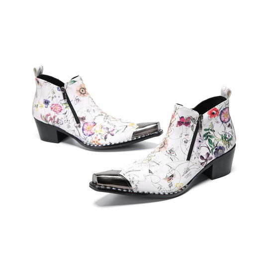 Pair of men's white genuine leather ankle boots with a colorful floral print and shiny metallic pointed toe caps.