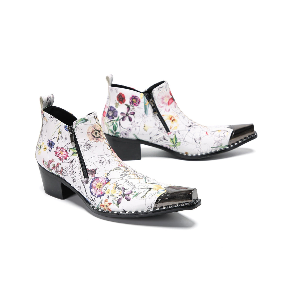 Pair of men's white genuine leather ankle boots with a colorful floral print and shiny metallic pointed toe caps.