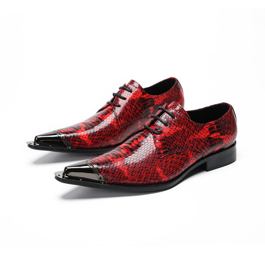 Pair of men's red snakeskin patterned leather derby shoes with pointed metal toe caps and black laces on a white background.