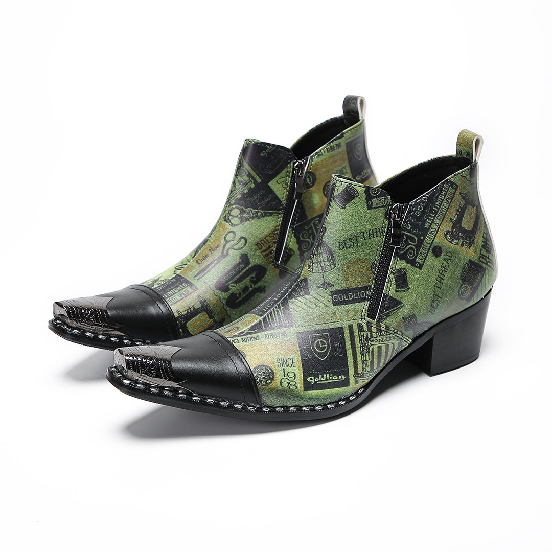 A pair of men's green and black patterned ankle boots with pointed metal toes and side zippers.