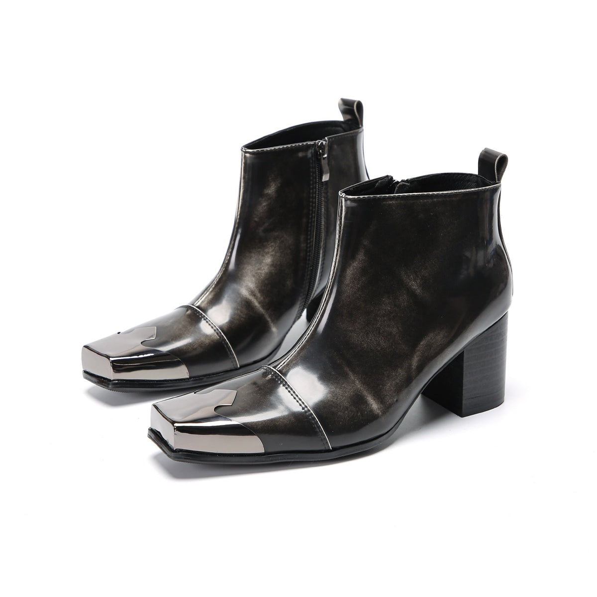 Pair of shiny black square toe ankle boots with metal tip and block heels