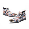 A pair of men's abstract print ankle boots with a gold metal cap toe and side zipper, shown against a white background.