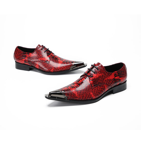 Pair of men's red snakeskin patterned leather derby shoes with pointed metal toe caps and black laces on a white background.