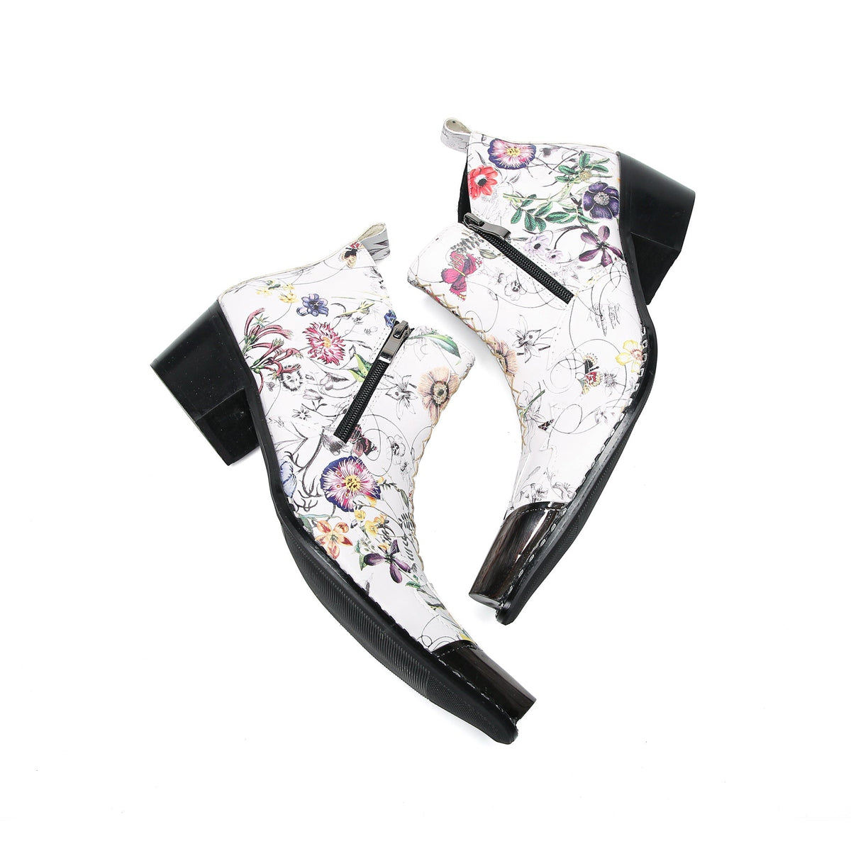 Pair of men's white genuine leather ankle boots with a colorful floral print and shiny metallic pointed toe caps.