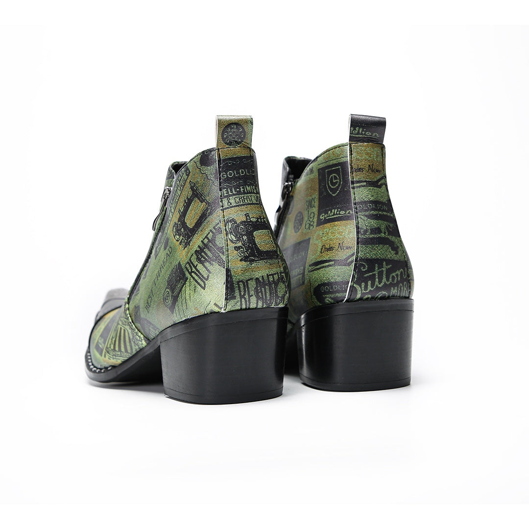 A pair of men's green and black patterned ankle boots with pointed metal toes and side zippers.