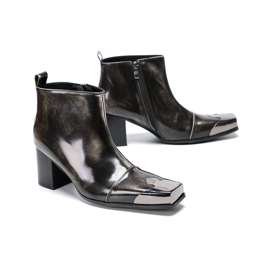 Pair of shiny black square toe ankle boots with metal tip and block heels
