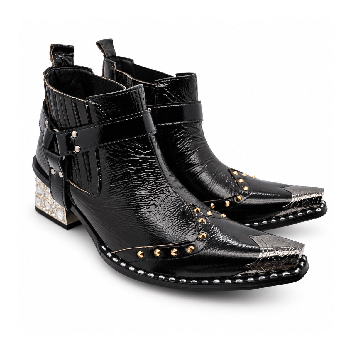 Black patent leather men's pointed toe ankle boot with metal toe cap, studded details, and a gold rhinestone-embellished
