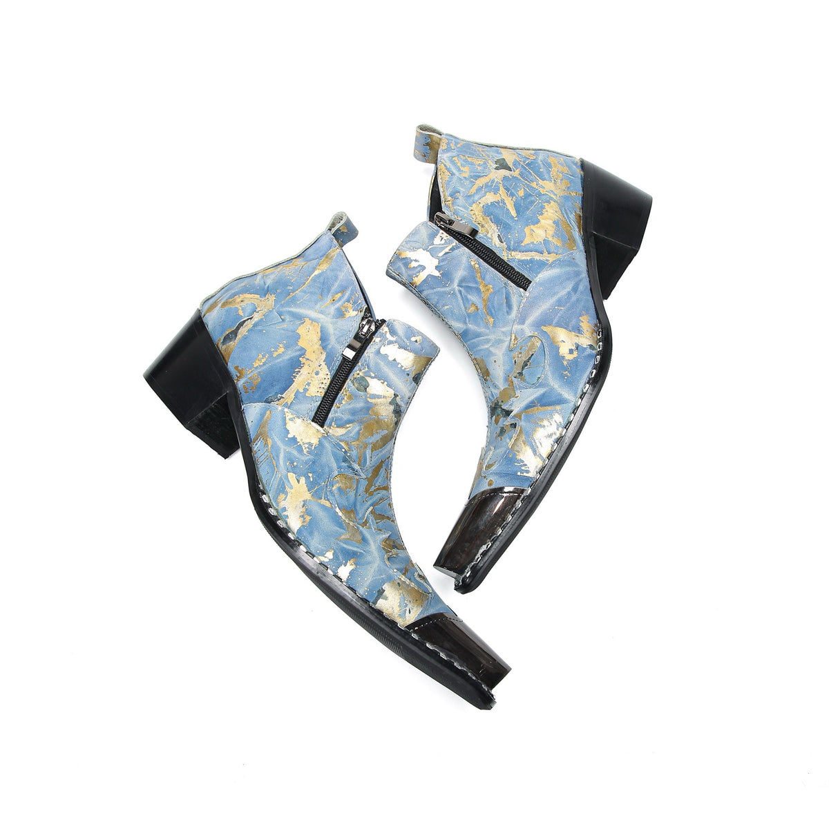 Pair of men's blue and gold splatter ankle boots with shiny metal toe caps and side zippers on a white background.