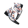 Pair of men's abstract print ankle boots with black leather pointed toe and metal tip, side zippers, and black block heels.