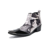 Pair of Aomishoes men's newspaper print ankle boots with pointed patent leather toe caps and side zippers on a white