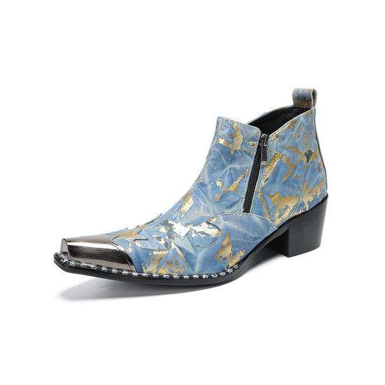 Pair of men's blue and gold splatter ankle boots with shiny metal toe caps and side zippers on a white background.
