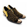A pair of men's black studded loafers with a gold metal toe cap, a gold and grey patterned upper, and a crystal-embellished