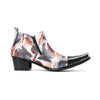 Pair of men's abstract print ankle boots with black leather pointed toe and metal tip, side zippers, and black block heels.