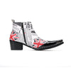 Pair of Aomishoes newspaper print and Union Jack pointed toe ankle boots with black patent leather toe caps and block heels.