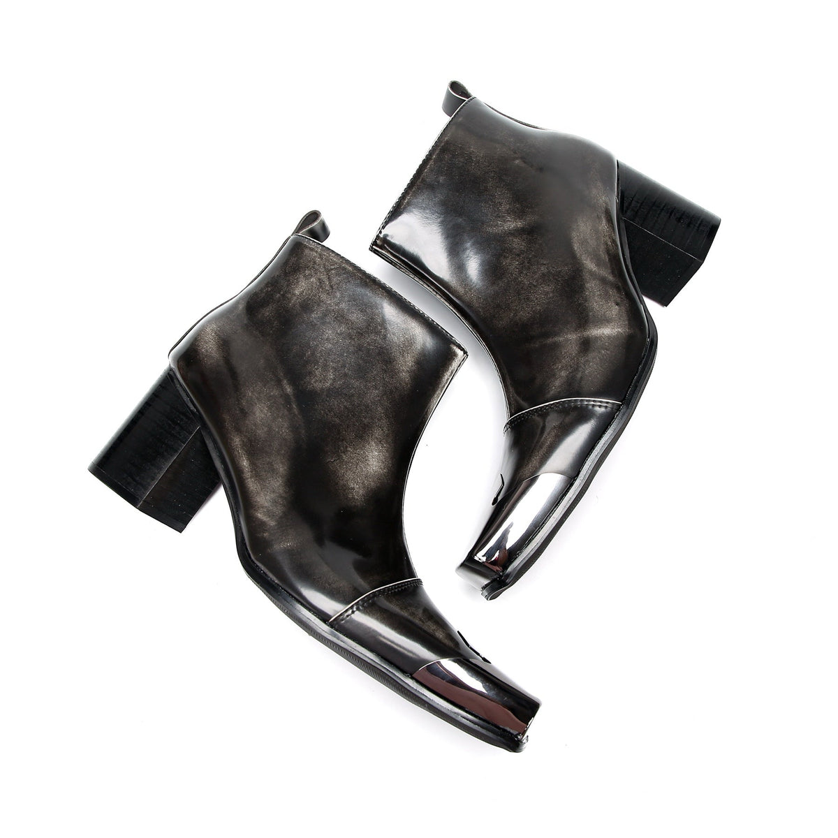 Pair of shiny black square toe ankle boots with metal tip and block heels