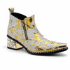 White and gold foil patterned ankle boot with a pointed metal toe, side zipper, and a block heel embellished with clear